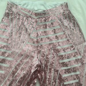 Ladie’s sequined bell bottom pants, small